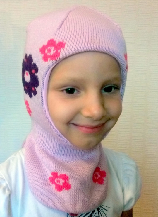 Шапочка-шлем для девочки Цветок Бабасик лиловая Фото