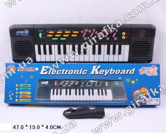 Орган TX-950A (48шт) батар, 32 клавиш, с микрофоном, радио, в кор. 47*13*4см Фото