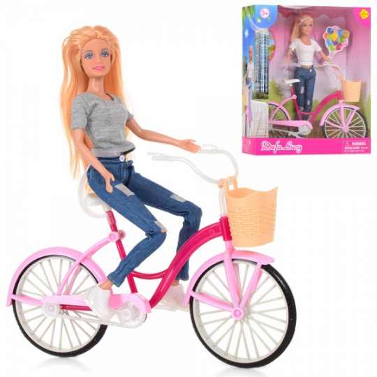 Кукла DEFA 8361-BF  28 см, велосипед 27 см, 2 вида, в коробке, 27-32,5-10 см Фото